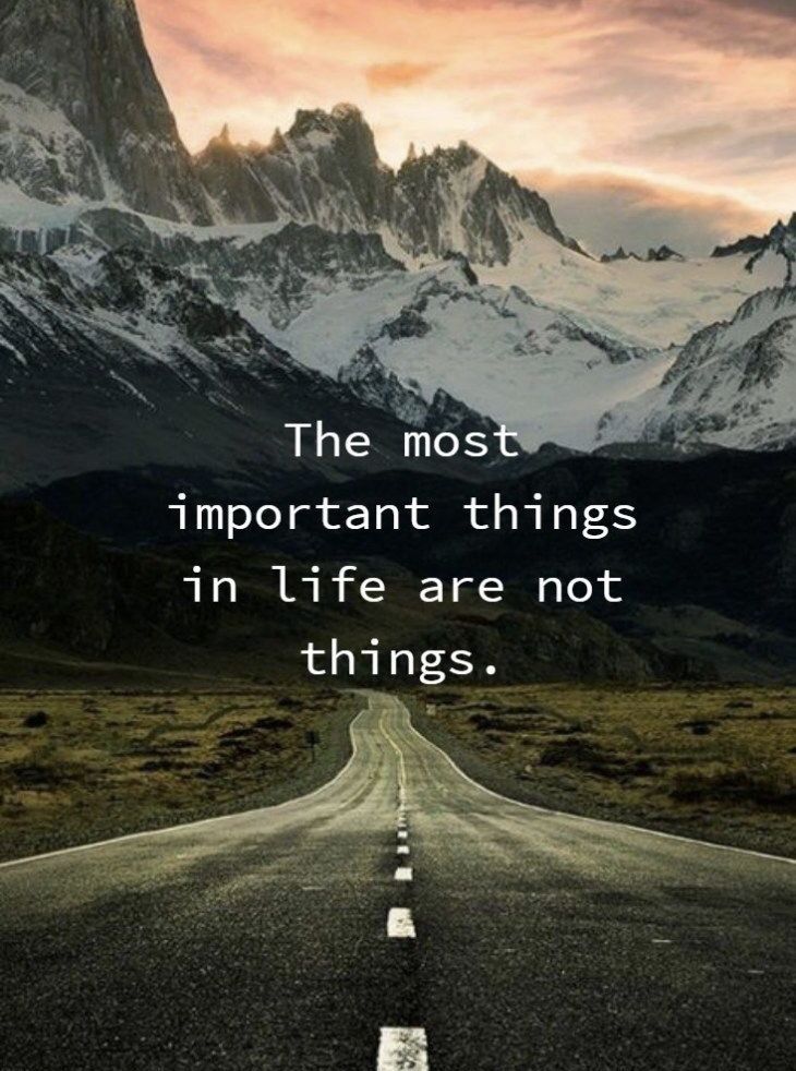 an empty road with mountains in the background and a quote about the most important things in life are not things