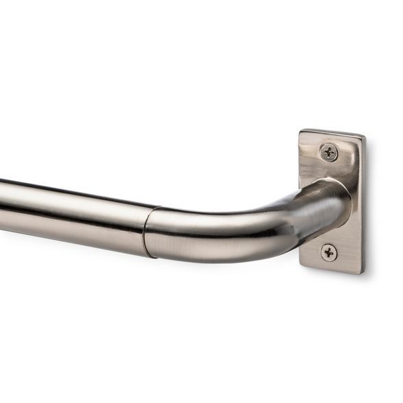 a stainless steel door handle on a white background