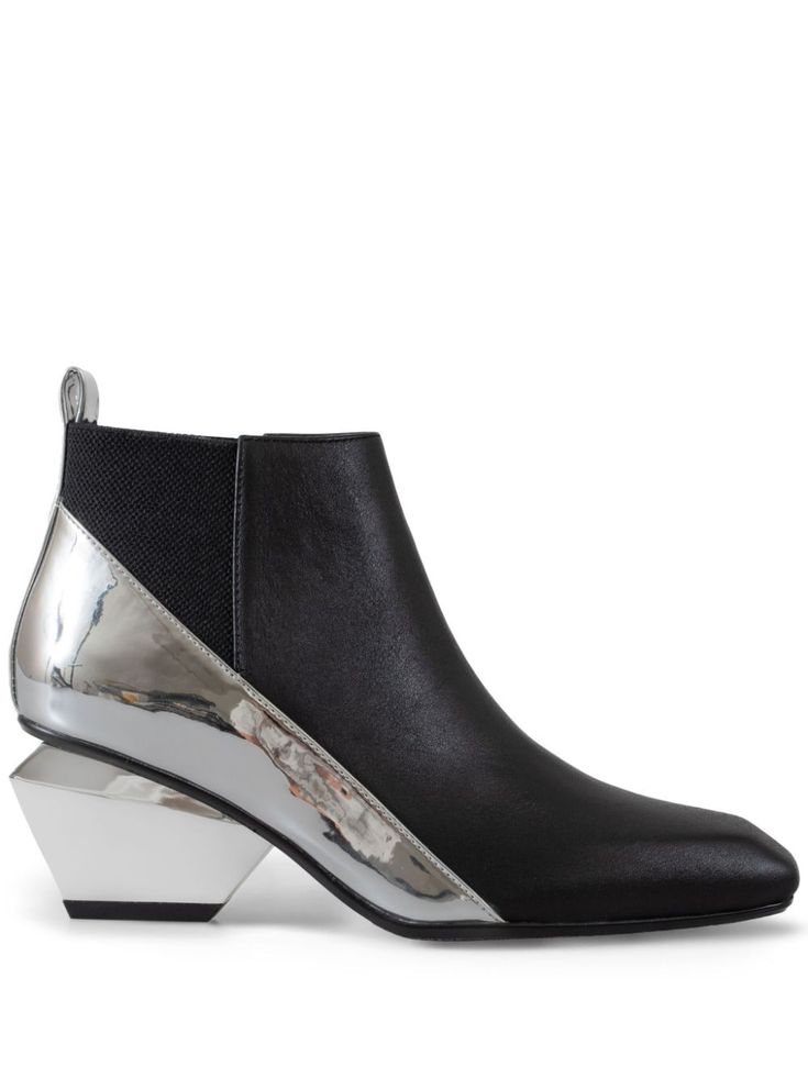 black/silver-tone calf leather metallic effect colour-block panelled design slip-on style high sculpted heel pull-tab at the heel almond toe branded leather insole rubber sole Luxury Slip-on Boots With Contrast Sole, Luxury Ankle-high Moto Boots With Rubber Sole, Tone Calves, Nude Boots, United Nude, Metallic Shoes, Black Leather Boots, Colour Block, Pull Tab