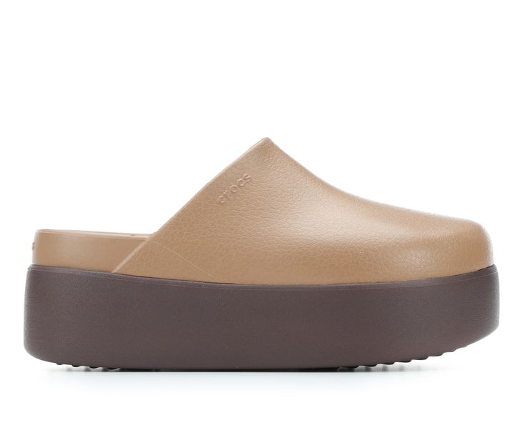 The Women's Crocs Dylan Platform Clog combines comfort with a touch of elevated style. Featuring a chunky platform sole and a sleek design, these clogs effortlessly enhance any casual look. Ideal for adding a trendy twist to your everyday wardrobe, they offer a perfect balance of comfort and chic simplicity. Non-marking outsole for traction and durability, Cushioned footbed for all-day comfort, Chunky 2\ platform sole for added height, Lightweight and durable Croslite™ material | Women's Crocs D Dylan Platform Crocs, Platform Outfit, Platform Clogs Shoes, Platform Crocs, Womens Clogs And Mules, Clogs And Mules, Platform Clogs, Elevated Style, Women's Crocs