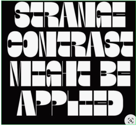 the words strange contrast against black and white text, which appear to be applied in different font styles