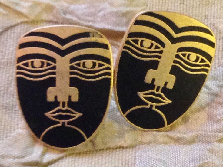 "Laurel Burch MAORI Tribal Face Cloisonne Earrings RARE Post Stud Vintage Jewelry 1980s Black White Gold Two amazing jet black and white shields of matte finish brass Cloisonne. Each measure approx. 1\" X 1\" with gold plated posts. Signed on the back: MAORI/Laurel Burch. A Genuine LAUREL BURCH COLLECTIBLE from the mid-1980s. This pair is in very nice condition, with no chips or repairs, there may be some very light, fine scratches or minimal wear around the edges. Laurel Burch went on to launch Maori Symbols, Cloisonne Earrings, Vintage Jewelry Box, Symbol Design, Laurel Burch, Black White Gold, Jewelry Earrings Studs, Costume Jewelry, Vintage Shops