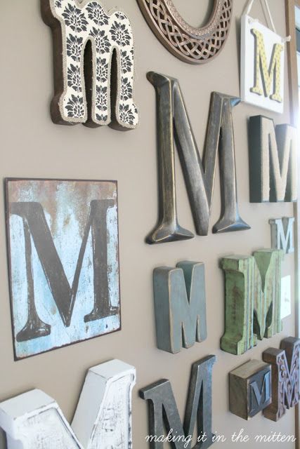 the letters are arranged on the wall to spell out the word m and m in different styles