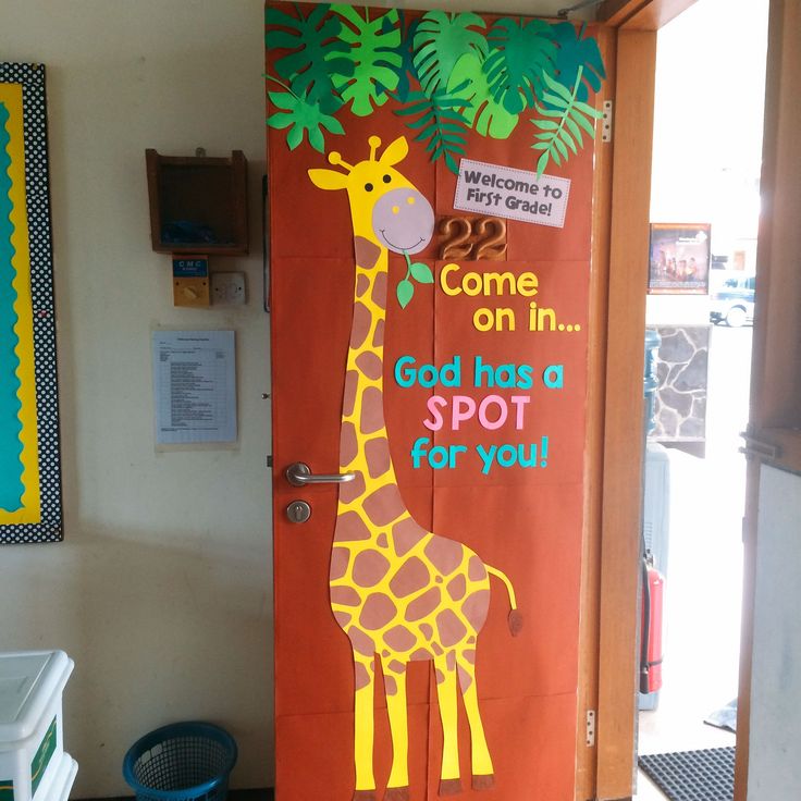 a door with a giraffe painted on it's side and the words, come on in god has a spot for you