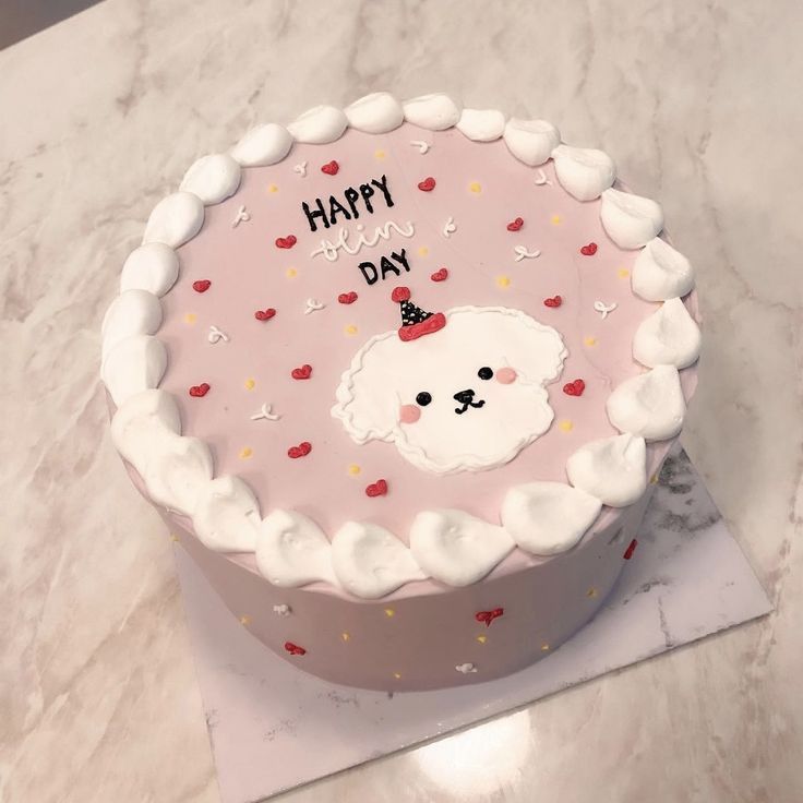 a birthday cake with a white sheep on it