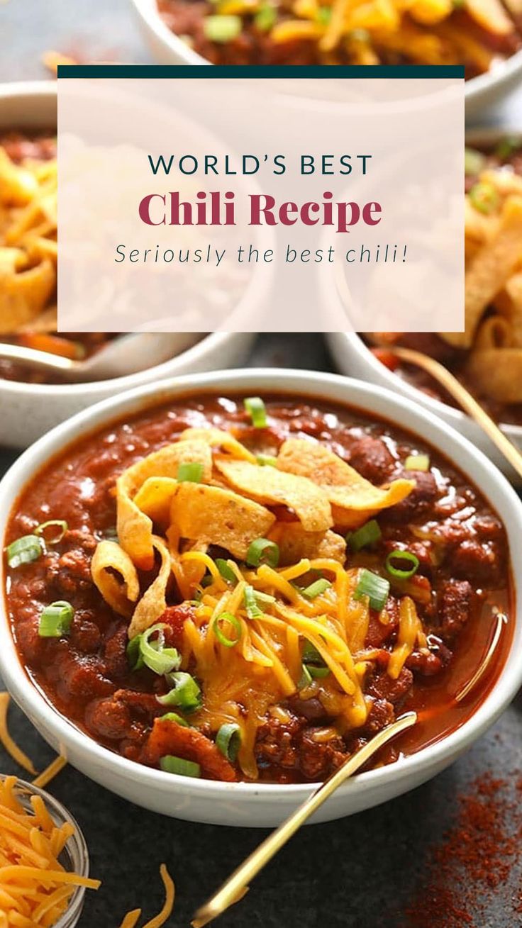 two bowls filled with chili, cheese and tortilla chips on top of a table