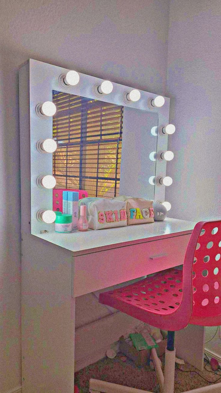 a desk with a mirror and lights on it