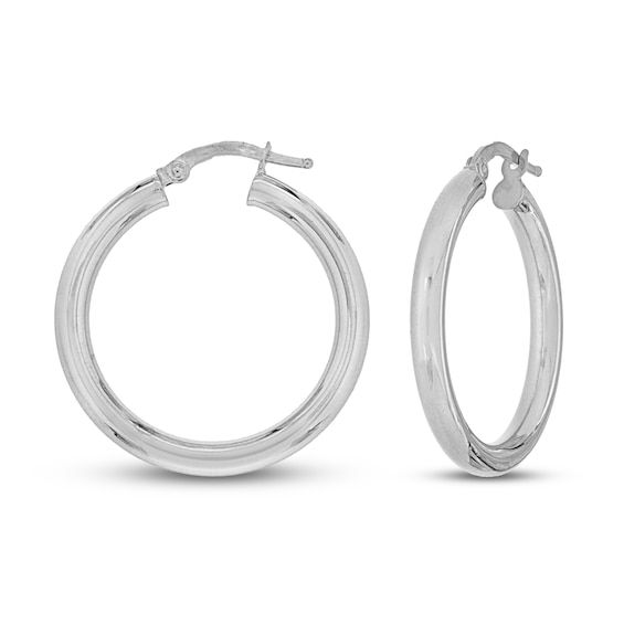 Lustrous hoops of high polish gold come together to form these elegant women's hoop earrings. Crafted in 14K white gold, the earrings secure in place with snap-lock backs. Earring height is 20mm. Hypoallergenic Hoop Earrings For Formal Occasions, Elegant Round Hinged Huggie Earrings, Elegant Hinged Huggie Earrings, Classic Round Hinged Huggie Earrings, Classic Huggie Earrings With Spring Ring Clasp For Anniversary, Classic Round Huggie Earrings With Shiny Finish, Classic Small Hoop Hinged Earrings, Classic Hinged Huggie Earrings For Formal Occasions, Small Hoop Hinged Huggie Earrings For Anniversary