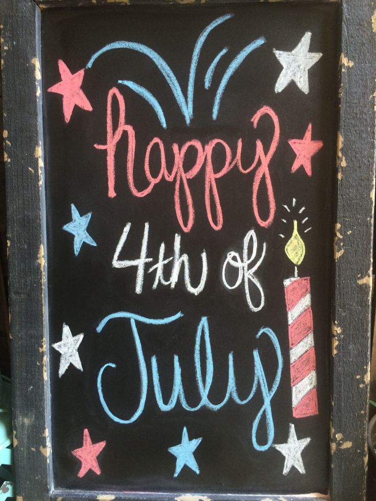 a chalkboard sign with the words happy 4th of july written in red, white and blue