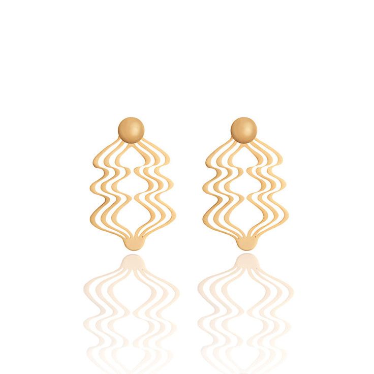 Inspired by the Cienaga Grande in her native Colombia, these playful earrings are a good energy flow and remind us the lightness of being. We are water and flow into the sea. Materials: 24k Gold Plated Brass Width : 47 mm.Length: 70 mm Designed in New York, handmade with love in Colombia. LINA HERNANDEZ Jewelry DesignerNew York Gold Drop Earrings With Artistic Design, Playful Earrings, Energy Flow, Good Energy, Handmade With Love, The Sea, With Love, Plating, New York