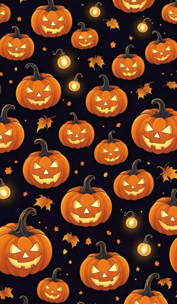 halloween pumpkins with glowing faces and stars on black background, seamless pattern stock photo