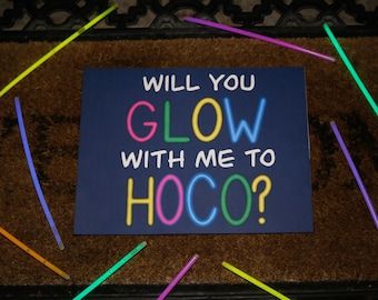 a sign that says will you glow with me to hoco?