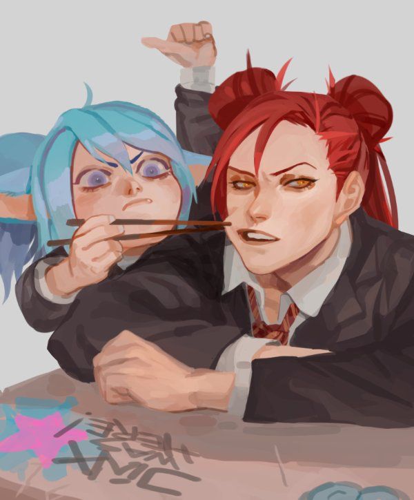 two people sitting at a table with chopsticks in their hands and one holding something up to her mouth