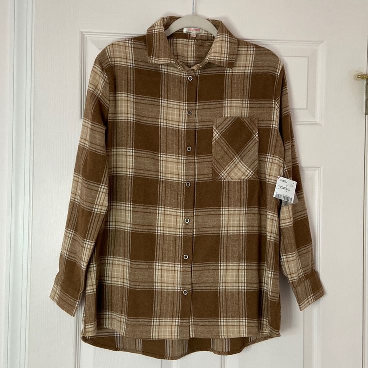 New With Tags/ Never Worn Brown And Tan Flannel Very Soft Material Slightly Longer In The Back Stella Tweed Brand Size Small **Color Is Slightly Lighter In Person Fall, Autumn, Winter, Apple Picking, Pumpkin Picking, Hay Ride, Halloween, Grunge, Skater, Casual Brown Flannel Shirt For Work, Brown Flannel Shirt With Button Closure For Work, Brown Button Closure Flannel Shirt For Work, Relaxed Fit Neutral Shirt For Fall, Beige Long Sleeve Flannel Shirt For Fall, Brown Long Sleeve Flannel Shirt For Spring, Fall Neutral Top With Button Closure, Neutral Shirt With Button Closure For Fall, Neutral Long Sleeve Shirt For Fall