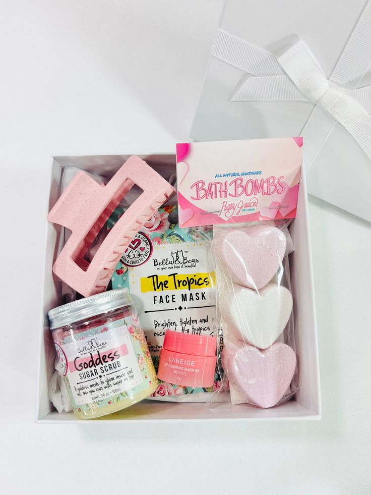 an open box containing soaps, marshmallows and other items