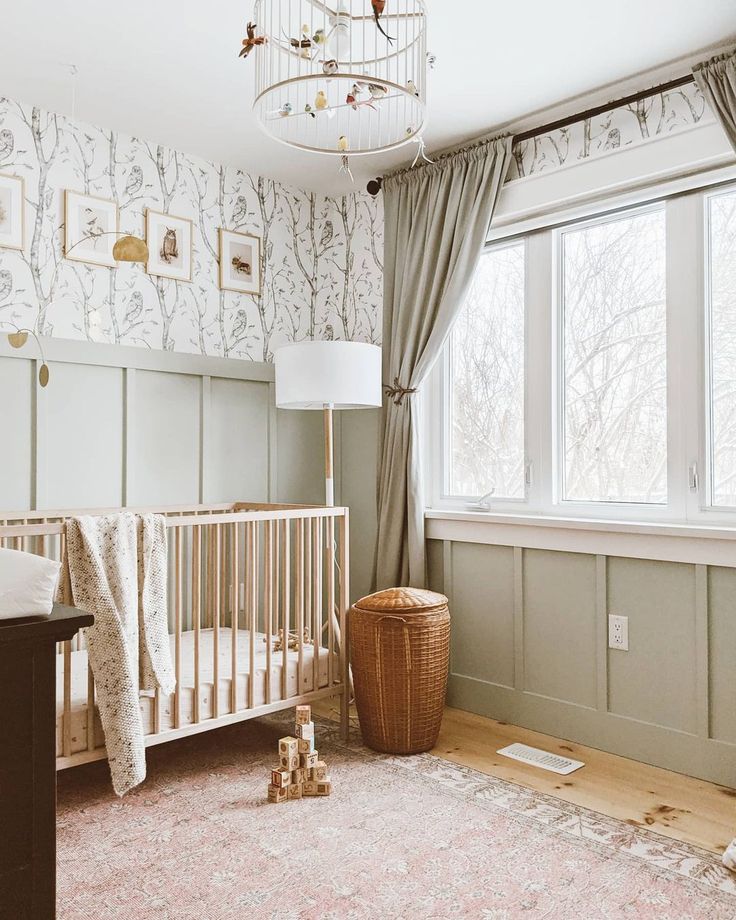 a baby's room is decorated in neutral colors