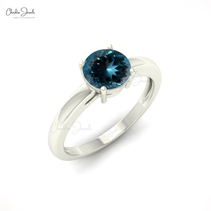 Description This gorgeous London Blue Topaz solitaire ring blends a classic design with a one-of-a-kind gemstone to create a truly stunning ring that will cherish for many years. The solitaire ring has a beautiful 6mm round cut London Blue Topaz in the center that weighs a total of 0.57 carats. London Blue Topaz is a birthstone for December. Rose Gold, Yellow Gold, and White Gold versions of this 14k solid gold ring are available for you. Product Details SKU CJ-R-1349-LBT Product dimension 21.62 London Blue Topaz Jewelry, Gemstone Solitaire Ring, Topaz Yellow, Single Stone Ring, Topaz Jewelry, London Blue Topaz Ring, Blue Topaz Stone, Jewelry Blue, Single Stone