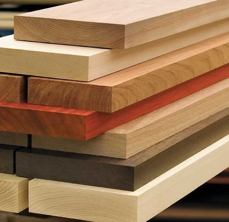 several different types of wood are stacked on top of each other