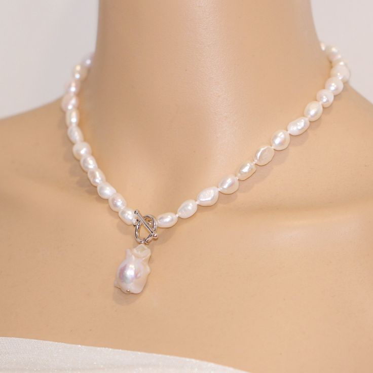 ON SALE The necklace is made of 8mm white color freshwater nugget pearls and 13-15mm white baroque pearl Item No: NK604 Material: freshwater pearls Shape:nugget shape and baroque pearl Size: 8mm and 13-15mm Color: white Luster: good Skin: with flaws Quality: AA clasp :silver 925 with white gold plated or yellow gold plated Hand Knotted: Yes Necklace length: any length can make, Packing: beautiful gift pouch,ready for gift giving Please contact Lisha freely if you have any specific demand or need Pearl Lariat Necklace As A Gift, White Baroque Pearl Lariat Necklace, Pearl White Lariat Necklace With Pearl Charm, Baroque Pearl Necklace With Lobster Clasp As Gift, White Pearl Toggle Necklace With Pearl Charm, White Pearl Toggle Necklace With Pearl Pendant, White Pearl Lariat Necklace With Pearl Drop, White Toggle Necklace With Pearl Chain, White Pearl Drop Lariat Necklace