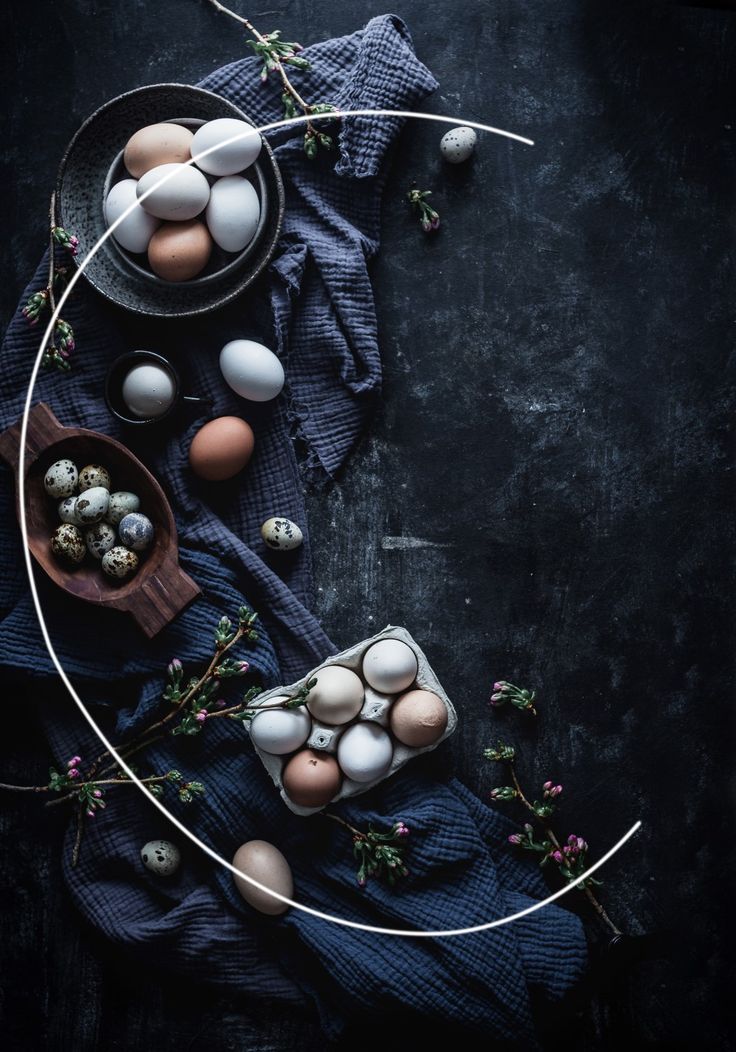 an overhead view of eggs in bowls on a table