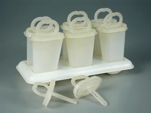 plastic cups and spoons are arranged on a tray