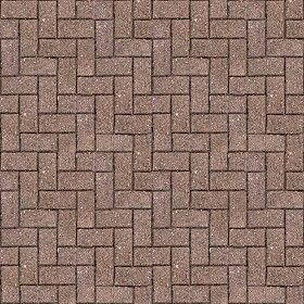 a brown brick wall with small squares on it