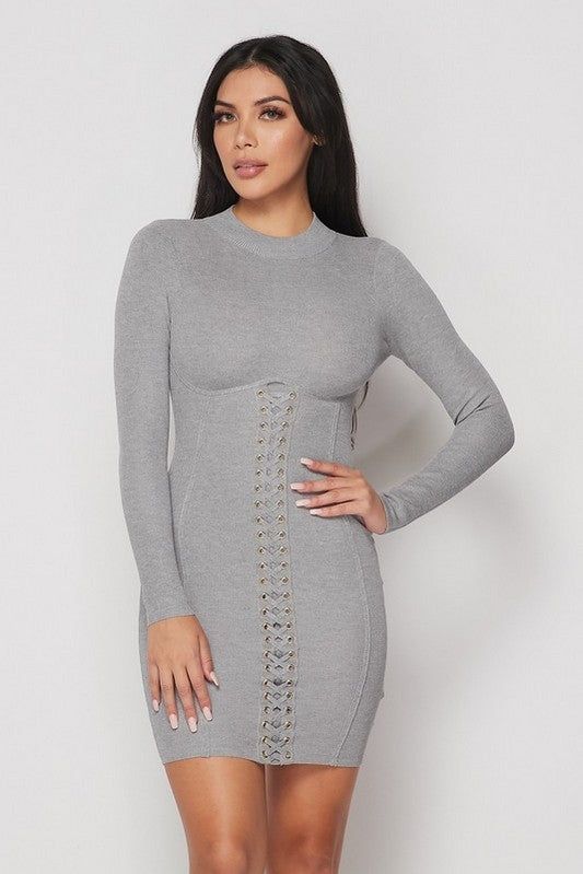 This Gray Ribbed Long Sleeves Corset Lace Up Dress from Haute Glam Boutique is perfect for the fall and winter seasons. Featuring a ribbed detailing, corset lace up, and long sleeves, this dress will have you looking both stylish and chic. Allow yourself to shine with this beautiful and unique piece. Lace Up Bodycon Dress, Corset Lace, Online Fashion Boutique, Corset Style, Romper With Skirt, Date Night Outfit, Lattice, Skirt Set, Jumpsuit Romper