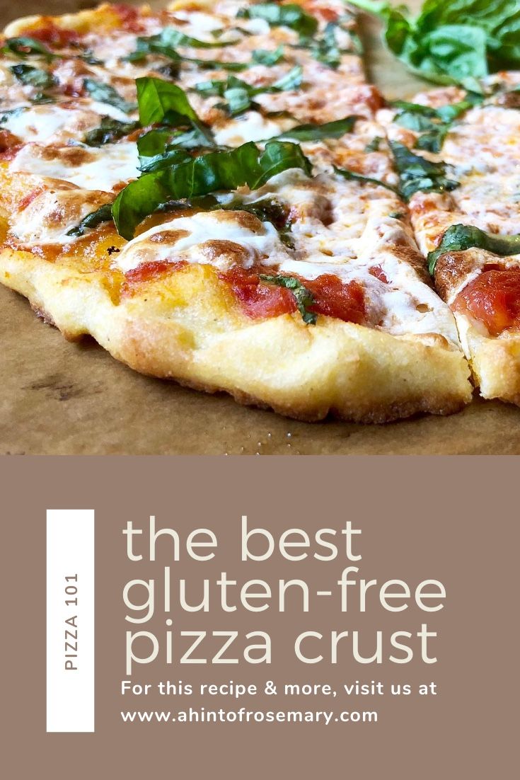 the best gluten - free pizza crust with spinach leaves on top is shown