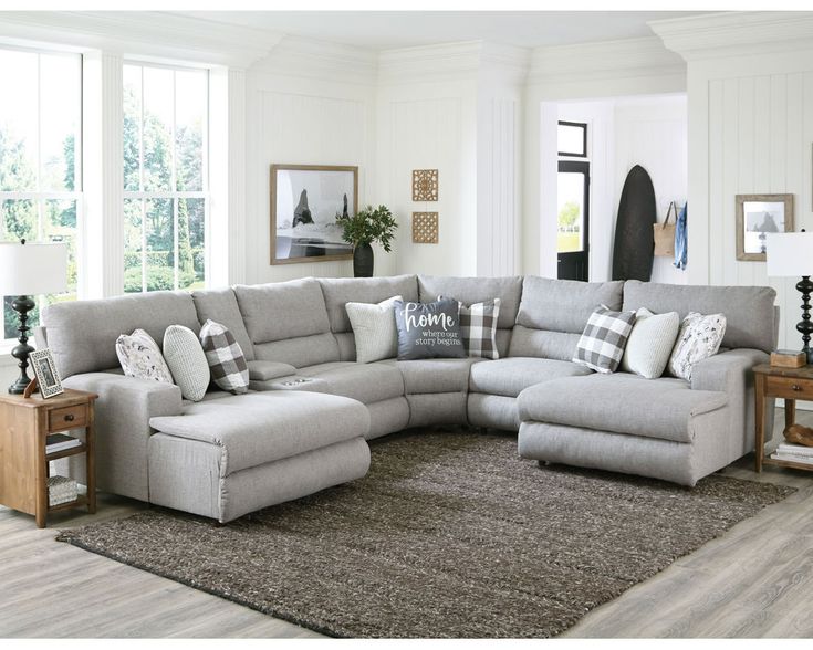 a living room with a large sectional couch