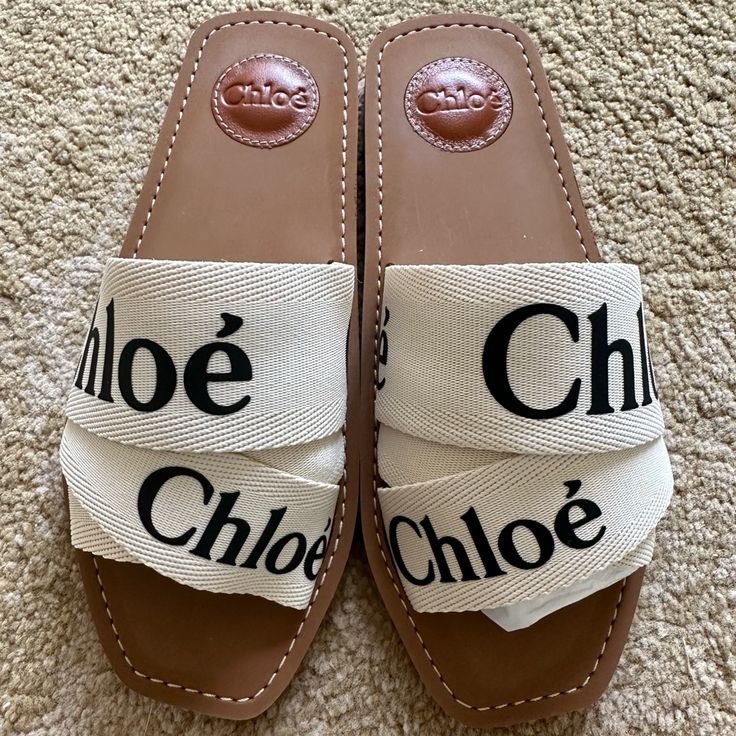 New, Never Worn Chloe Woody Sandal In Cream/White. These Are Made In Italy (Vs Vietnam), And Size 38. I Am A 7.5 And Sized Up Like The Reviews Suggest. It Fits Perfectly In Length, But There’s Too Much Room In The Top Because I Have Flat Feet. They Are Super Comfy, And Otherwise A Beautiful Shoe. Comes With Box And Dust Covers. I Paid Sales Tax, And There Are Posh Fees Designer White Slip-on Mules, White Flat Sandals With Heel Strap, White Mules With Rubber Sole For Beach, Chic White Ankle Strap Mules, White Slides With Rubber Sole For Spring, White Rubber Sole Mules For Summer, White Flat Mules With Rubber Sole, Chic White Mules With Rubber Sole, White Open Heel Slides For Summer