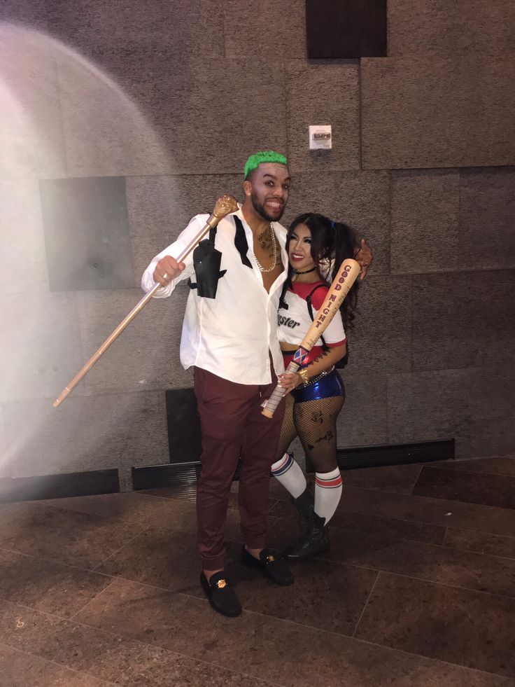 a man and woman dressed up in costumes