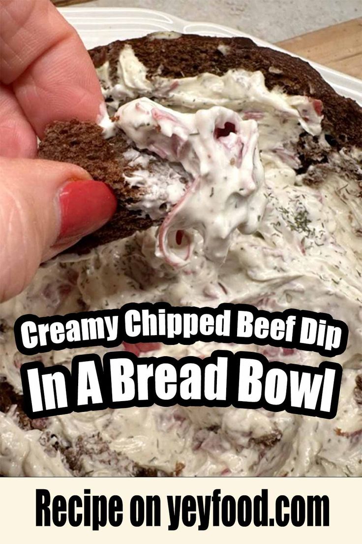 a person dipping cream cheese on top of a brownie in a bowl with the words creamy chipped beef dip in a bread bowl