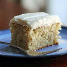 a piece of cake sitting on top of a blue plate with a fork in it