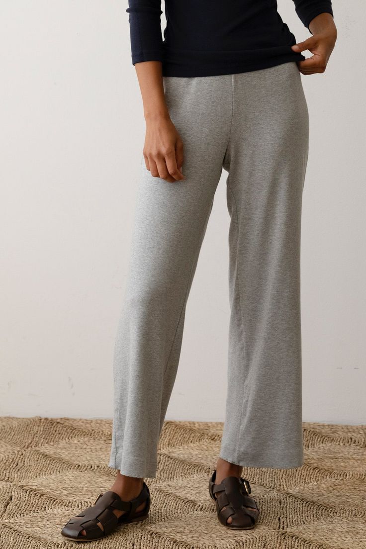 The Baby Rib Scallop Pant is crafted from our dreamiest, butter-soft fabric—it's like a hug from a stick of butter (you truly have to feel it to believe it). Designed with a comfy elastic waistband, cropped fit, and scalloped edges at the hem. These pants blend cozy comfort with effortless style. Made in Los Angeles Comfortable Bottoms With Elastic Waistband And Straight Hem, Relaxation Wide-leg Bottoms With Elastic Waistband, Soft Stretch Bottoms For Loungewear, Soft Texture Bottoms For Spring Loungewear, Soft Texture Loungewear Bottoms For Spring, Bottoms With Elastic Waistband For Lounging, Fitted Bottoms With Elastic Waistband For Lounging, Fitted Lounge Bottoms With Elastic Waistband, Gray Comfort Waistband Pants For Loungewear