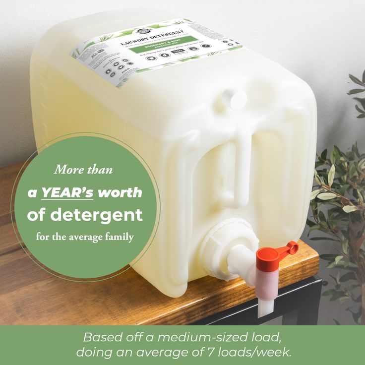 a gallon of deterant sitting on top of a wooden table