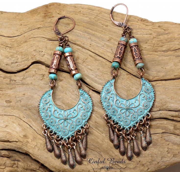 This is stunning pair of Boho dangle earrings.  Each antique copper patina chandelier pendant is topped with antique copper cylinder beads and turquoise Imperial Jasper rondelle beads. These decorative pendants are also embellished with tiny teardrop charms dangling from the bottom that create motion with your every movement. They look heavy, but each earring weighs 7 grams which is equal to a nickel and a penny together.  You can choose your style of earwires from the drop down menu. Each pair Bohemian Metal Chandelier Earrings With Ear Wire, Bohemian Teardrop Chandelier Earrings Nickel Free, Bohemian Teardrop Chandelier Earrings For Pierced Ears, Nickel-free Bohemian Chandelier Earrings, Nickel Free Teardrop Bohemian Chandelier Earrings, Bohemian Chandelier Earrings With Ear Wire For Festivals, Bohemian Dangling Beads Drop Earrings, Copper Chandelier Dangle Earrings For Pierced Ears, Turquoise Chandelier Dangle Earrings For Festivals