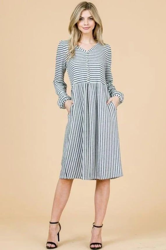 For the weekend or travel this knit classic is ready for them all. soft and body skimming, you'll love wearing it on it's own or layered up when the weather cools down. Laurie Davidson, V Neck Midi Dress, White Fabrics, Week End, The Weekend, Cold Shoulder Dress, Porter, Dresses For Work, Midi Dress