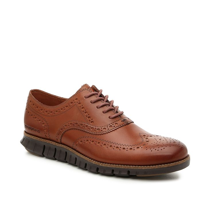 Cole Haan-ZeroGrand Wingtip Oxford The ZeroGrand wingtip oxford from Cole Haan flaunts the perfect balance of tailored and casual style. Featuring a sporty EVA midsole with Grand.øs technology, this lace-up can be dressed up or down for any outfit. Wingtip Oxford Lace-up Shoes With Textured Sole, Brown Wingtip Lace-up Oxford Shoes, Casual Wingtip Lace-up Shoes With Textured Sole, Brown Wingtip Sneakers For Business, Masculine Brogue Oxfords Lace-up, Textured Sole Wingtip Oxfords, Masculine Lace-up Oxfords With Brogue Detailing, Brown Wingtip Lace-up Shoes For Business Casual, Masculine Wingtip Oxfords With Branded Insole