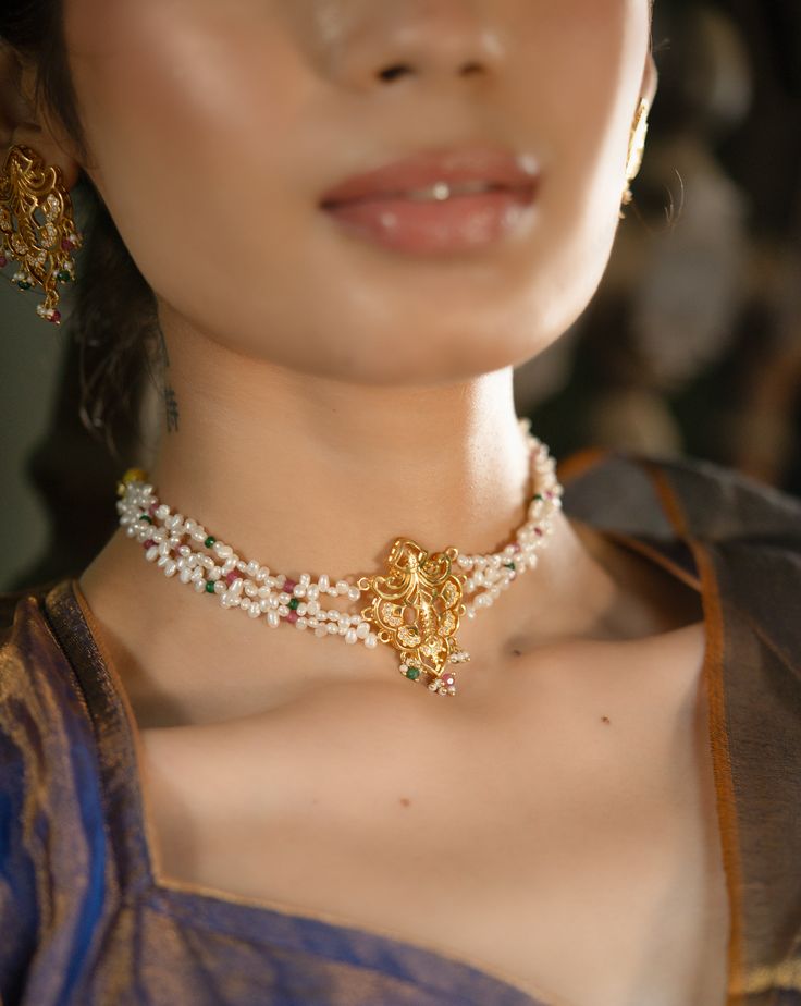 Jahanara Necklace – Adorner of the World’s Beauty Inspired by the name Jahanara, meaning "Queen of the world" and "Bringer of beauty," this handcrafted necklace is a stunning celebration of artistry and elegance. Blending the enchanting styles of Art Nouveau and the Mughal Era, the Jahanara Necklace features a captivating jaali-cut motif at the center, drawing inspiration from intricate latticework. Surrounding the neckline are luxurious strands of uneven pearls, rubies, and emeralds, creating a Styles Of Art, Semi Precious Jewelry, Handcrafted Necklace, Silver Moon, Bangle Set, Silver Cuff, Charm Earrings, Earring Necklace, Silver Bracelets