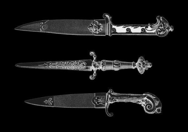 three different types of knifes are shown in black and white, with ornate designs on the blades