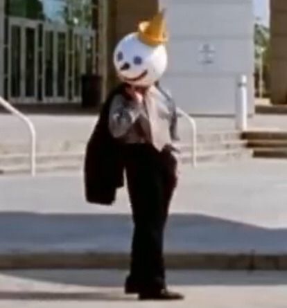 a person in a panda suit walking down the street