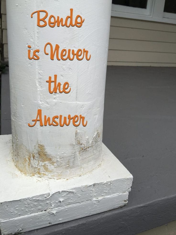 a white pole with an orange message on it that says bendo is never the answer