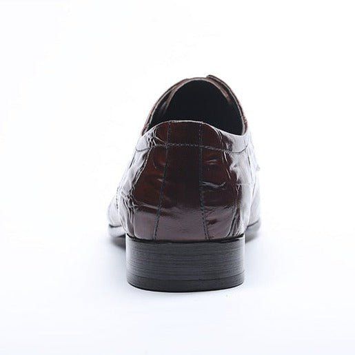 Introducing the GatorLuxe Exquisite Lace-Up Pointed Toe Brogue Dress Shoes, a symbol of sophistication and elegance. Crafted with genuine cow leather, these shoes exude luxury and style, while the solid pattern showcases a timeless appeal. Elevate your style and make a statement with these must-have brogue shoes. Fitted Slip-on Oxfords For Formal Occasions, Elegant Wingtip Lace-up Shoes With Red Sole, Elegant Lace-up Shoes With Red Sole, Fitted Slip-on Oxfords With Brogue Detailing, Elegant Brown Lace-up Shoes For Formal Occasions, Burgundy Brogue Dress Shoes For Business, Semi-formal Burgundy Wingtip Dress Shoes, Wingtip Oxfords With Red Sole For Work, Elegant Slip-on Oxfords With Red Sole