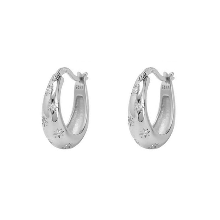 PRICES MAY VARY. Material: Cute star cz hoop earrings are made of 925 sterling silver. Hypoallergenic, lead-free, nickel-free, is a good choice for sensitive ears. Lucky Star Small Huggie Hoops Earrings Size: inner diameter :10mm,outter diameter:14.8mm. Comfortable &Stylish: The lightweight chunky drop dupes extra earrings are just the perfect size for every day wear, not too big not too small. The clasp closing makes it super easy and confortable to put on and stay on. The chunky style hoop is Silver Christmas Jewelry, Mini Silver Hoop Earrings, Silver Cartilage Earrings, Silver Earrings Hoop, Evry Jewels Silver, Small Hoop Earrings Silver, Cute Earrings Silver, Silver Hoop Earrings Aesthetic, Extra Earrings