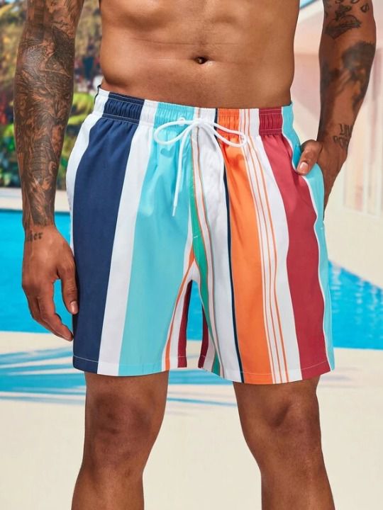 Make a statement with our Colorful Striped Swim Shorts. These swim shorts feature a captivating combination of bold and vibrant colors in a striped pattern, creating a lively and energetic look. The colorful stripes add a sense of fun and individuality to your swimwear, making it a perfect choice for beach outings or poolside lounging. Details: Pattern Type: Striped Details: Patched, Drawstring Type: Bottoms Bottom Type: Shorts Fabric: Non-Stretch Composition: 100% Polyester Care Instructions: M Multicolor Swimwear With Built-in Shorts For Vacation, Multicolor Beachwear Shorts For Summer, Multicolor Swimwear With Built-in Shorts For Pool, Multicolor Shorts For Summer Vacation, Multicolor Swim Trunks For Poolside, Multicolor Short Bottoms For Vacation, Multicolor Beachwear Shorts For Vacation, Multicolor Swimwear With Built-in Shorts For Beach, Multicolor Vacation Bottoms Short Length