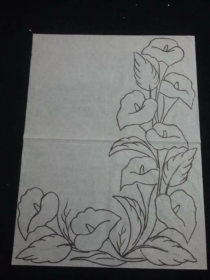 a piece of paper with flowers drawn on it