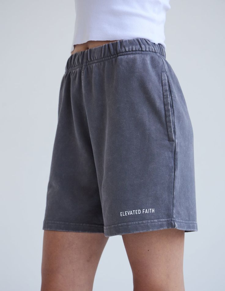 Meet your new go-to for effortless style and comfort: the Basics Women’s Short. Carefully designed to be as versatile as you are, this short is ideal for lounging or movement and sure to provide the wearability you'll need with a clean design you'll love.     Size: Model is 5'9" and wearing a size Small. Fit: Relaxed, Women's Fit Color: Smoke Grey Composition: 100% Cotton Features: Super Soft, Pre-Shrunk, Hidden Drawcord, Garment Dyed Basic Cotton Activewear With Built-in Shorts, Everyday Activewear With Built-in Shorts, Gray Short Activewear For Loungewear, Casual Relaxed Fit Solid Athletic Shorts, Basic Relaxed Fit Shorts, Casual Short-length Loungewear Activewear, Relaxed Fit Comfortable Athletic Shorts, Comfortable Relaxed Fit Athletic Shorts, Casual Super Soft Relaxed Fit Activewear