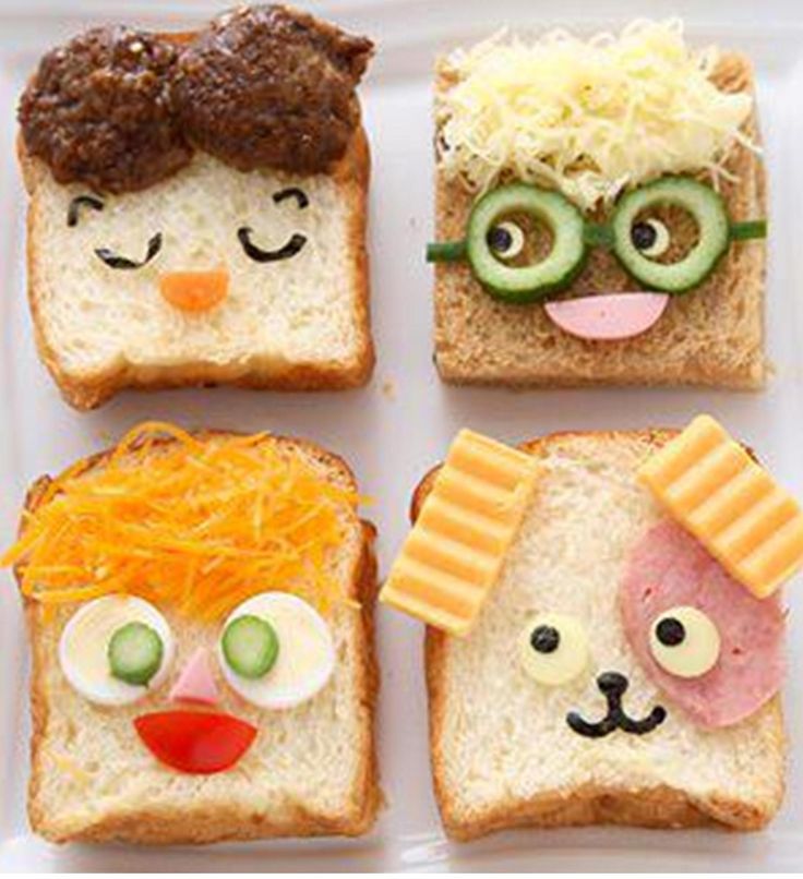 four slices of bread with faces on them