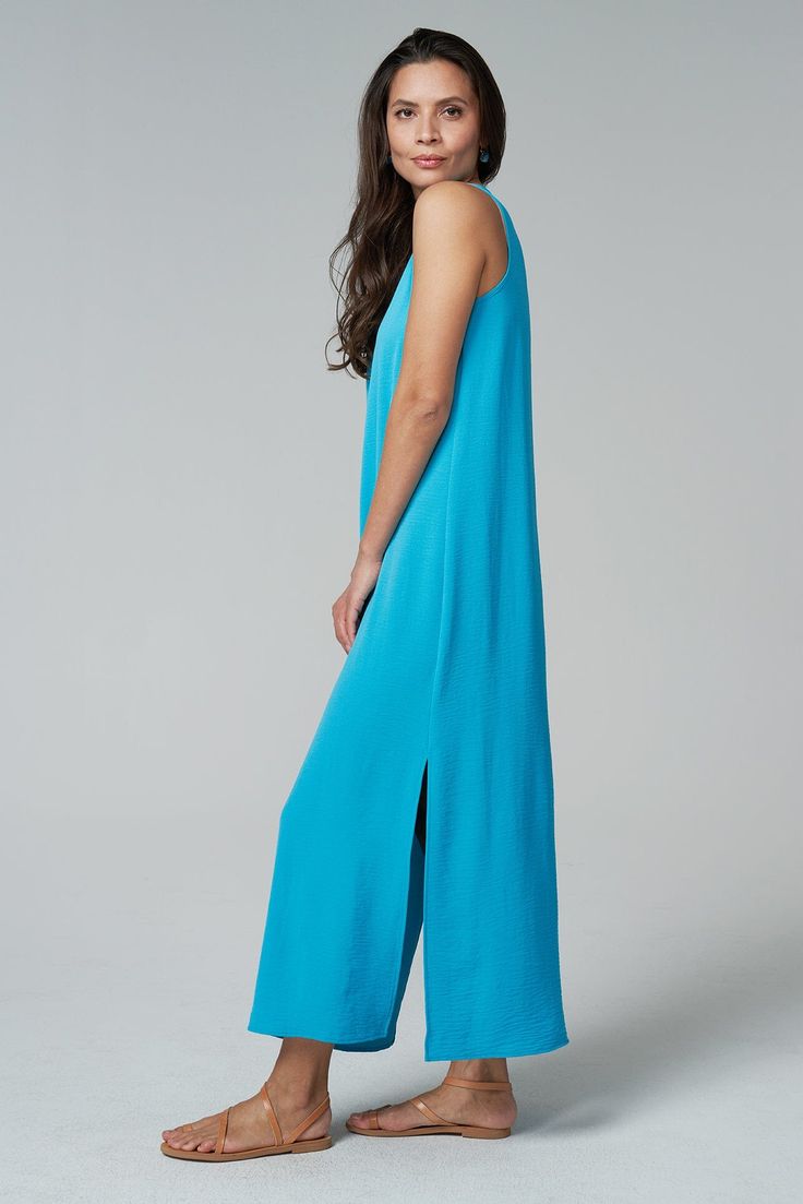 Our best-selling maxi dress is a summer staple. From weekend brunch to beach weddings, you'll wear this flowing style everywhere this season. ✓ All-Day Comfort ✓ Travel Friendly ✓ Day to Night ✓ Machine Washable DETAILS V neck Side slits FIT Regular fit True to size Model is 5'8" and wears size S MEASUREMENTS Length: 52" from shoulder (size S) FABRIC + CARE 100% polyester airflow Cold water wash on delicate. Line dry. Santorini Dress, Capri Blue, Weekend Brunch, Coral Blue, Day To Night, Summer Staples, Beach Weddings, To Night, Summer Essentials