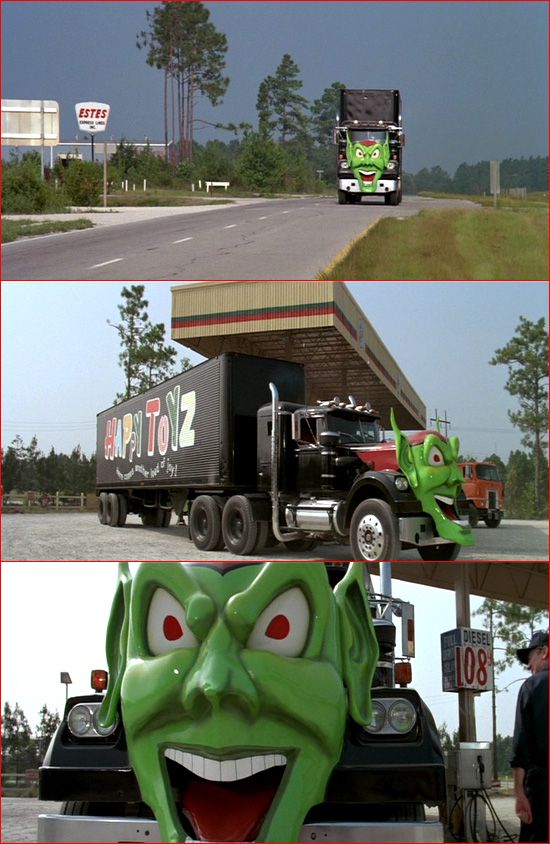 there is a green monster on the back of a truck and an image of a man with his mouth open